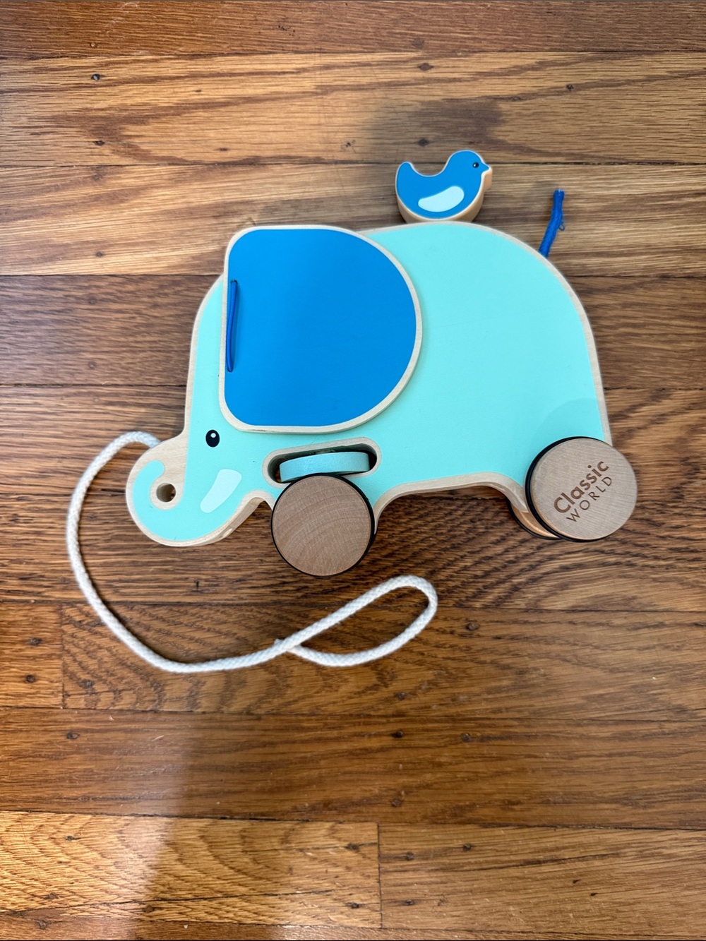 Classic world pull along wood elephant